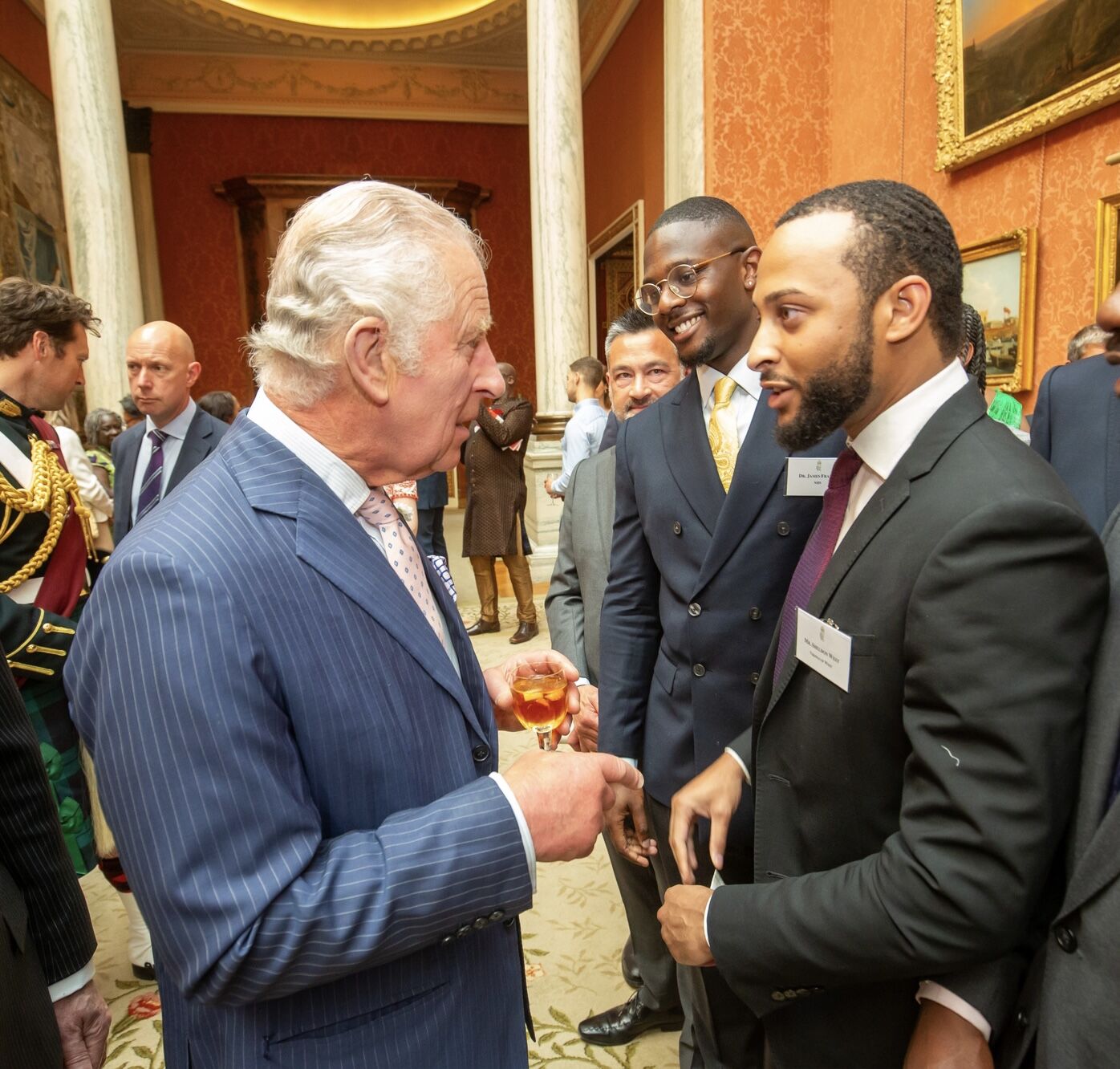 Dr. James Frater at Buckingham Palace with King Charles III